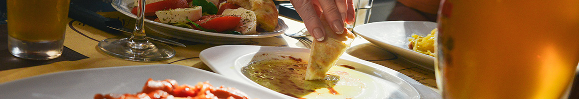 Eating Greek Mediterranean at The Greek Place restaurant in Surfside, FL.